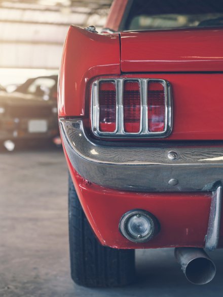 Close up rear view of red Retro classic car, Vintage tone