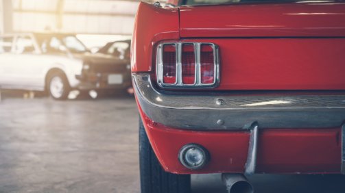 Close up rear view of red Retro classic car, Vintage tone