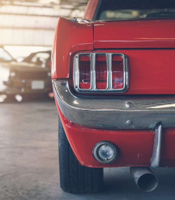 Close up rear view of red Retro classic car, Vintage tone